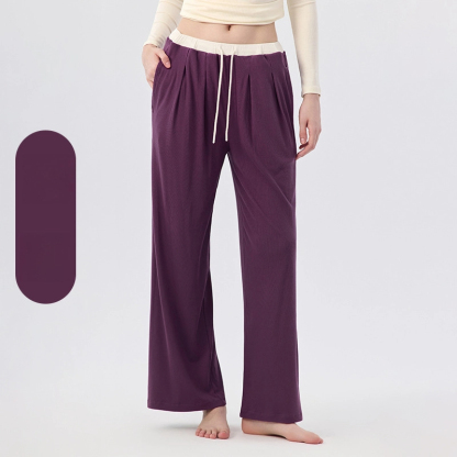 The clouds are loose and cover the hips, And the contrasting color is lazy and wide-leg pants