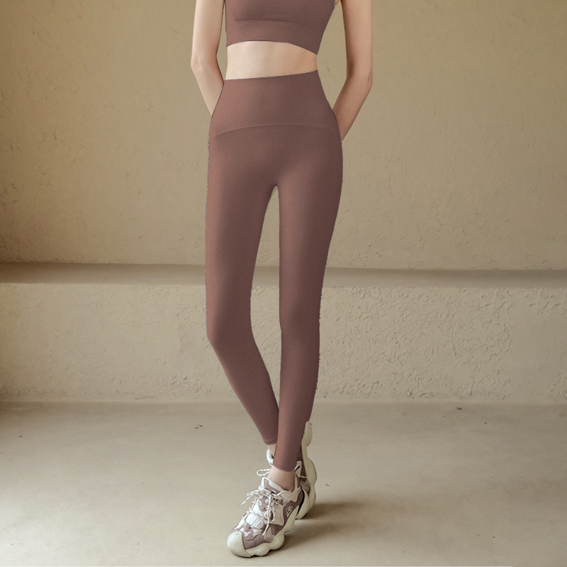 Wearing high-waisted tight trousers