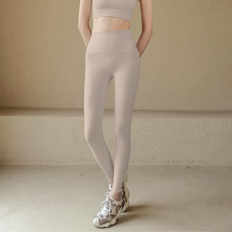 Wearing high-waisted tight trousers