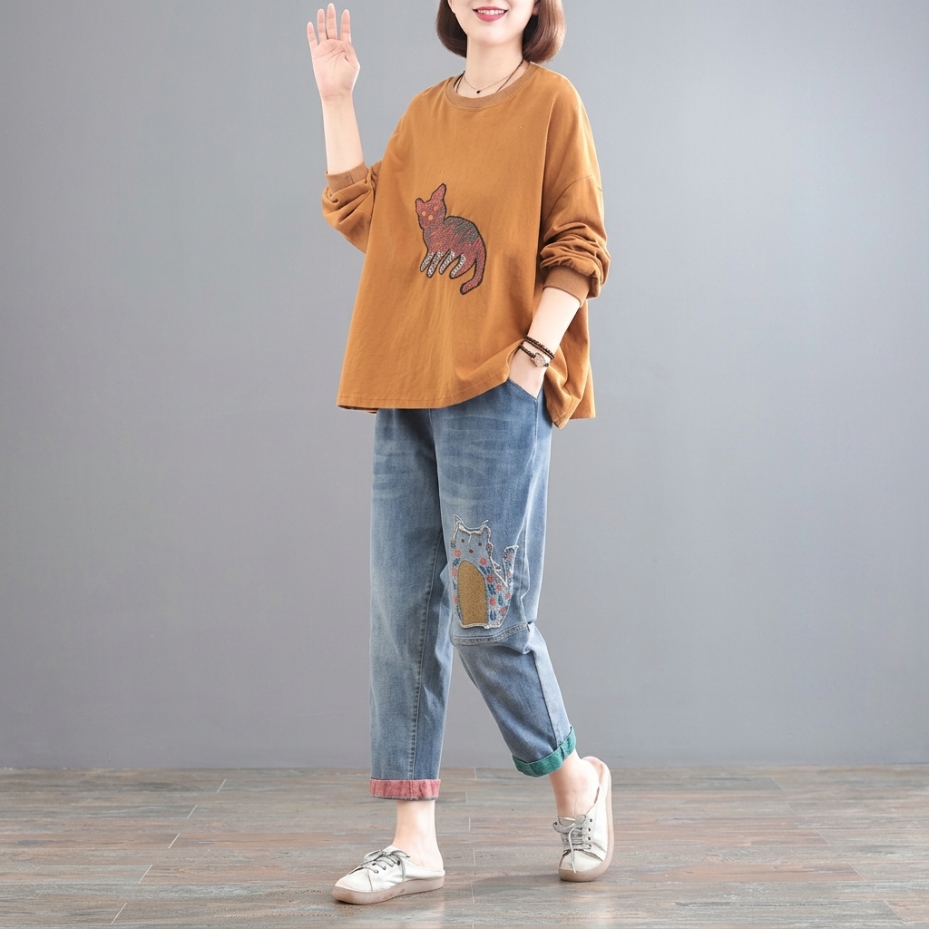 @韓版大碼遮肉貓咪刺繡貼布洋氣九分哈倫牛仔褲