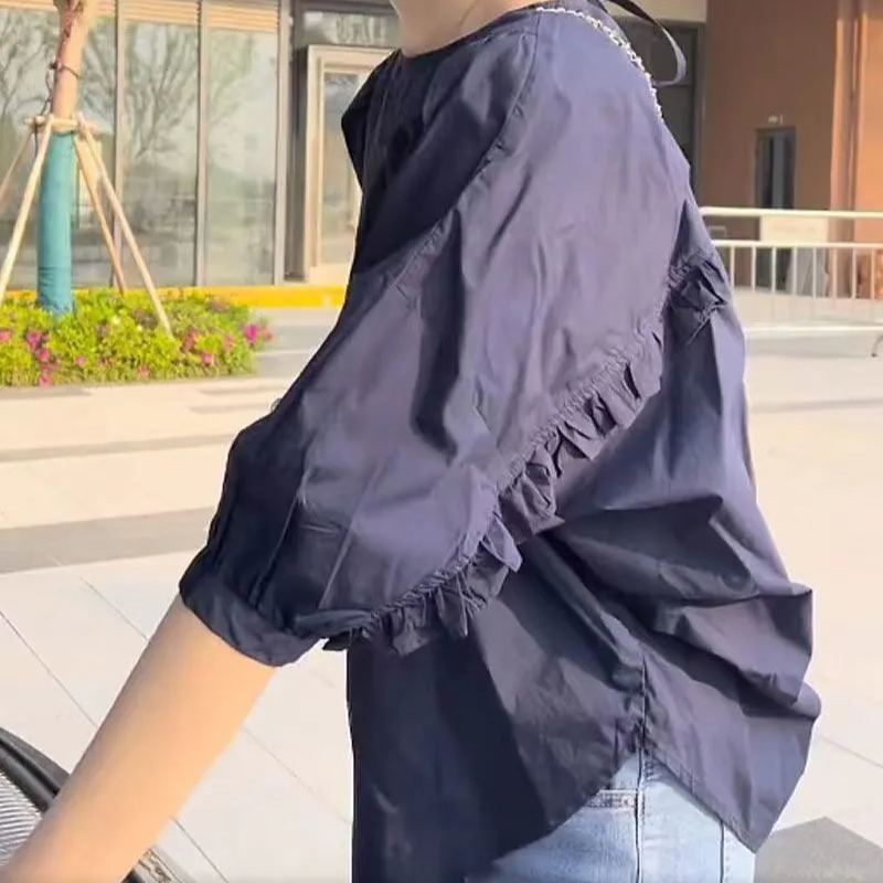 寬鬆顯瘦大碼木耳邊不規則設計感襯衫