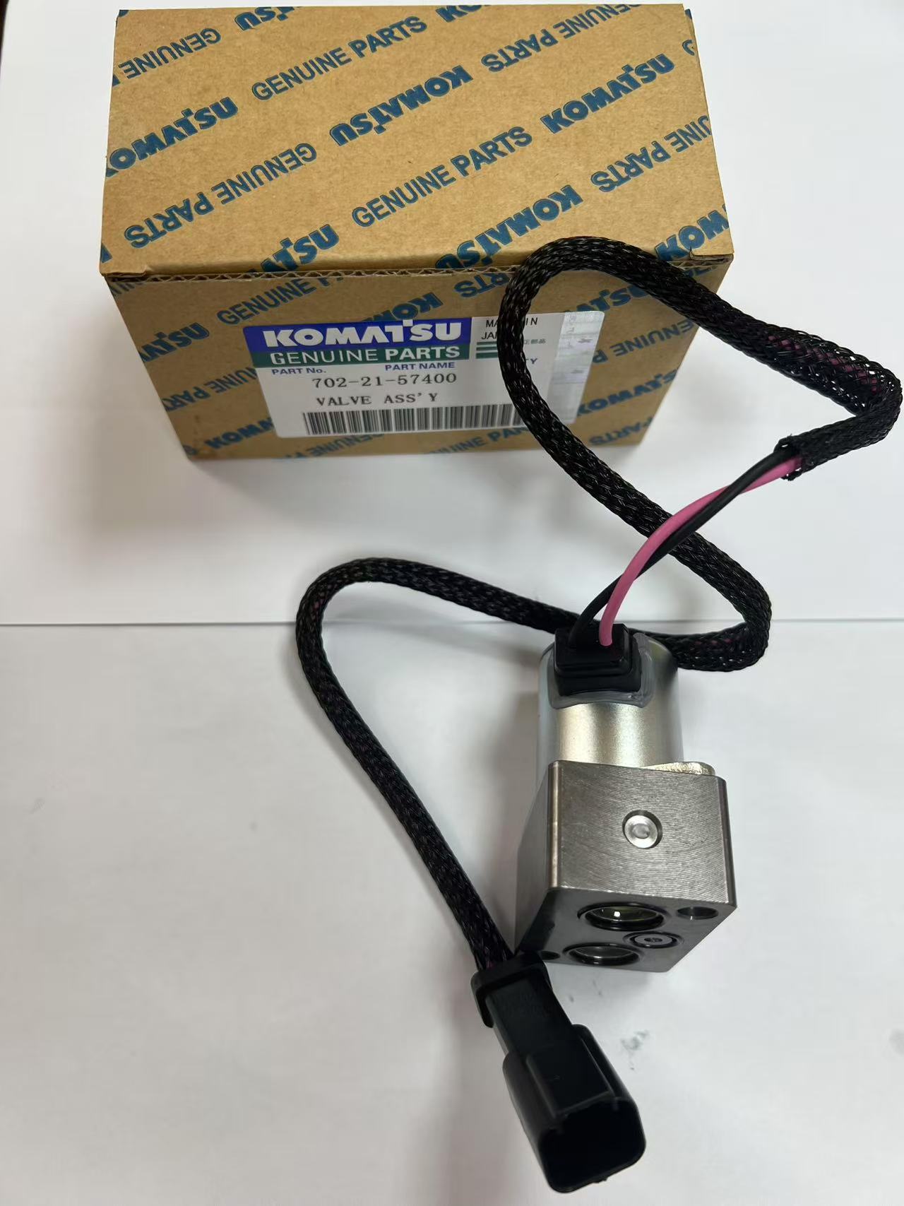 OEM Komatsu 702-21-57400 hydraulic pump solenoid valve.