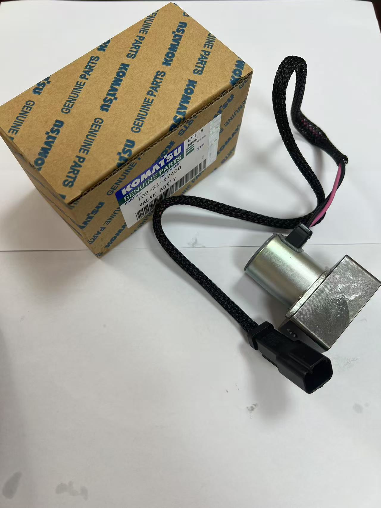 OEM Komatsu 702-21-57400 hydraulic pump solenoid valve.