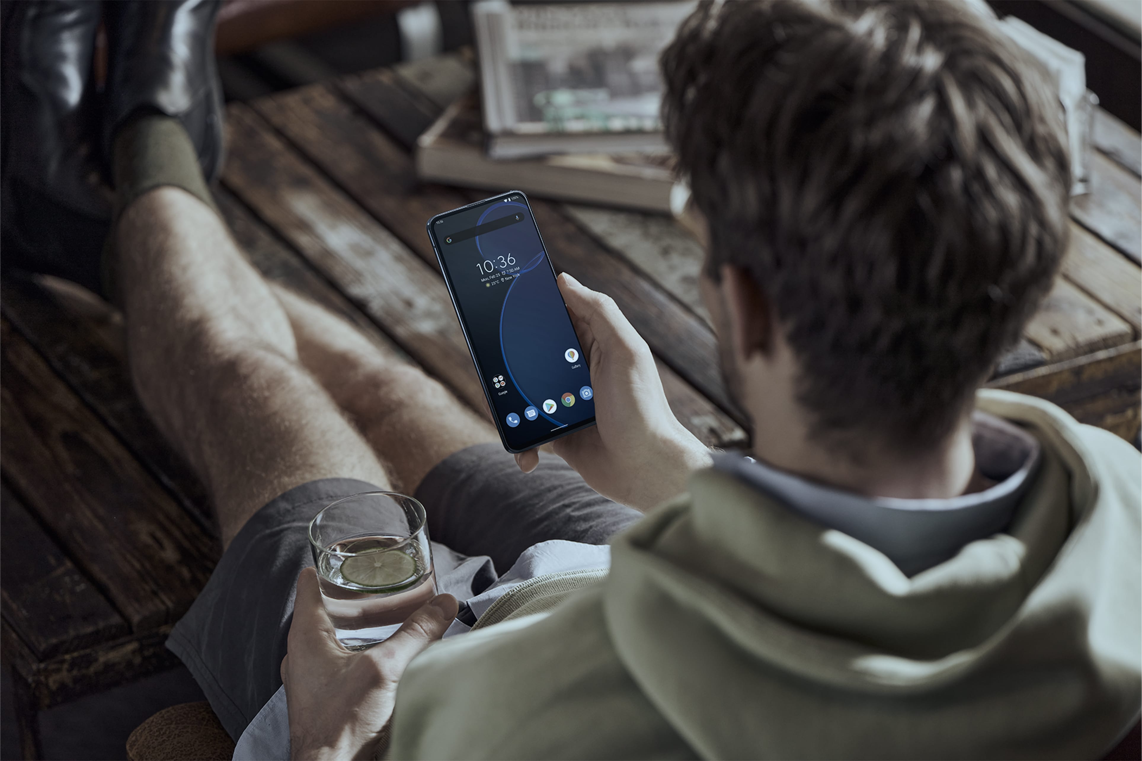 A man is looking at his mobile phone