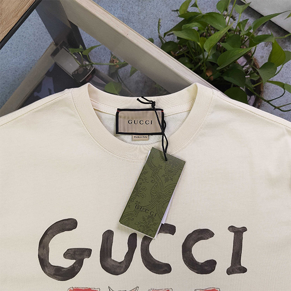 グッチ GUCCI 猫がスイカを食べる柄 Tシャツ 半袖 レディース メンズ