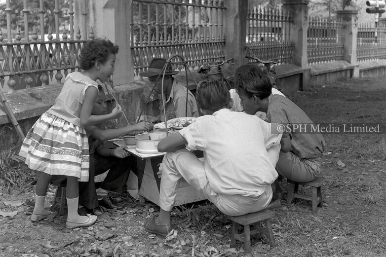 Satay Feast at a Street Hawker during Hari Raya 1962