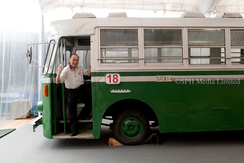 Bus Conductor Posing with a Vintage STC Bus 2016