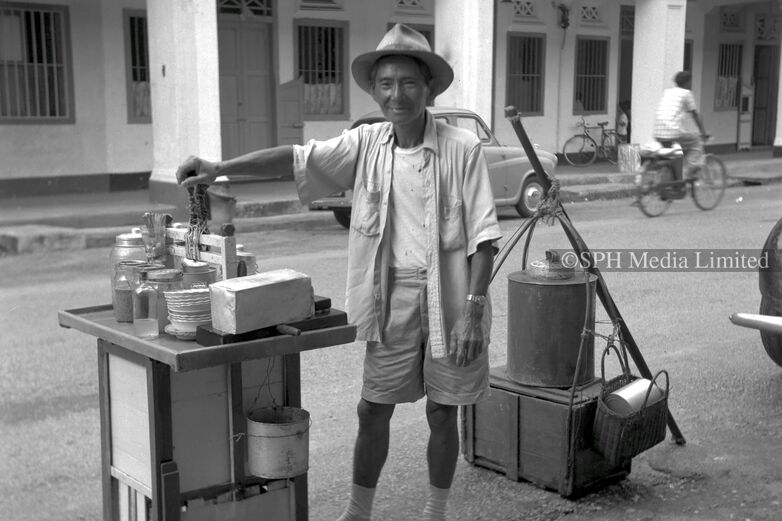 Itinerant Hawker on the Streets at Geylang 1960