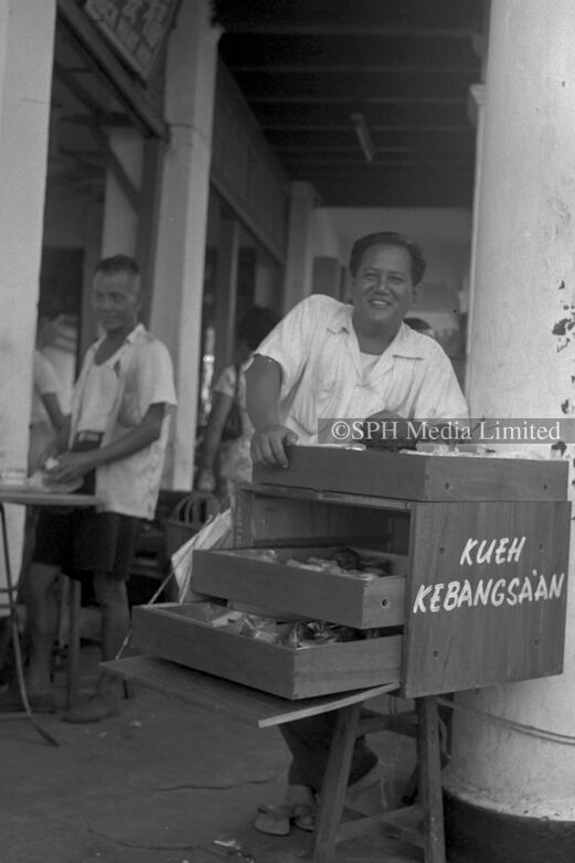 Street Hawker Selling Kueh from a Drawer 1960