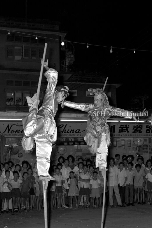 Stilt Walking in CNY Procession at Happy World 1963-My Sg Memories