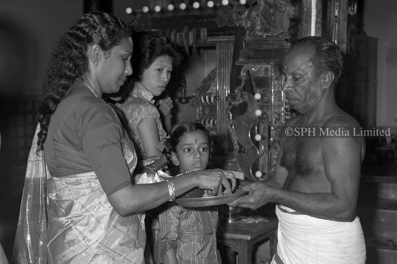Prayer at Sri Thendayuthapani Temple 1964