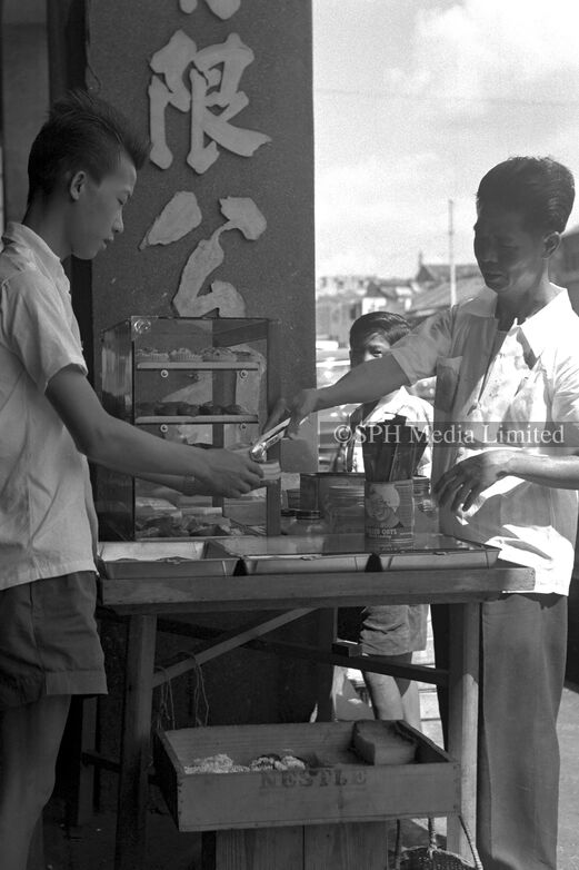 A Humble Stall Selling Snacks Outside Shophouse 1960