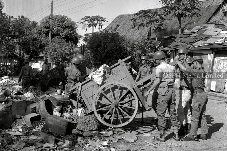 Cleaning Up After A Flood With SAF Personnel 1969-My Sg Memories