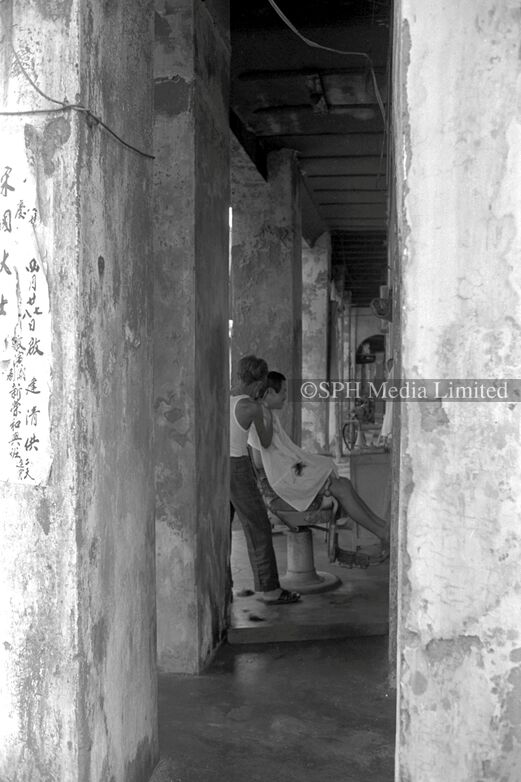 Barber at Work in Five-Foot Way at Boat Quay 1985