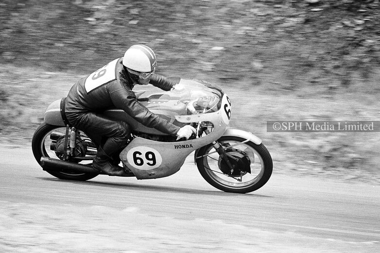 Giichi Suzuki on His Honda Bike 1961 Mug