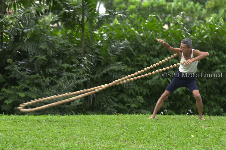 Swinging giant beads for exercise, 2003 Print