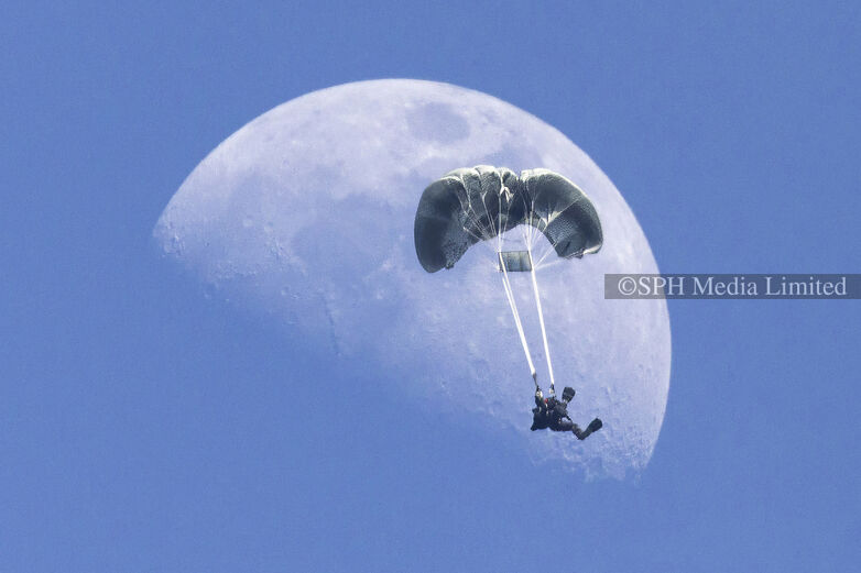 Naval diver in the moon at NDP 2025 Print
