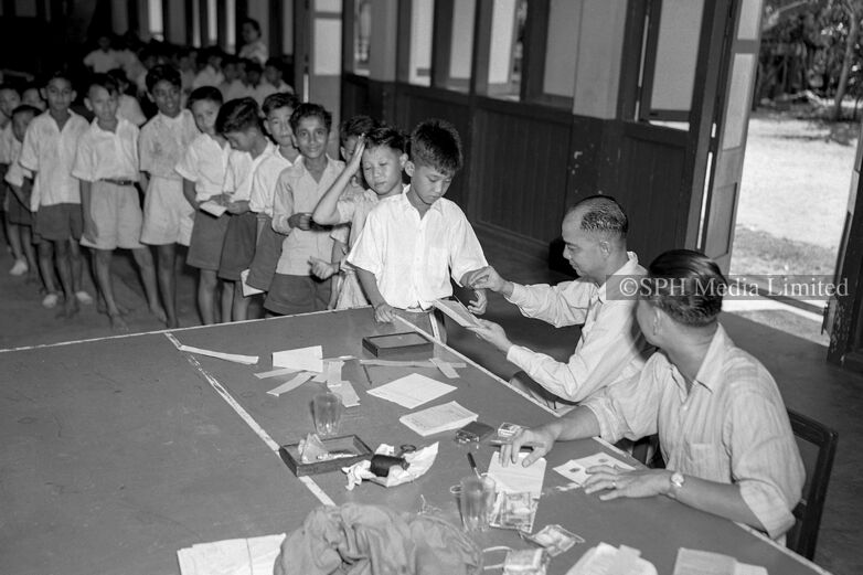 Students opening POSB account, 1951 Print
