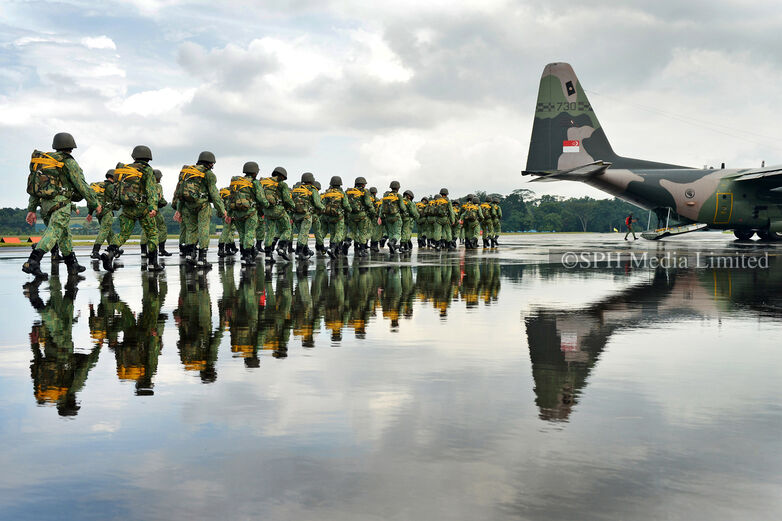 Parachutists boarding a C-130, 2013 Print