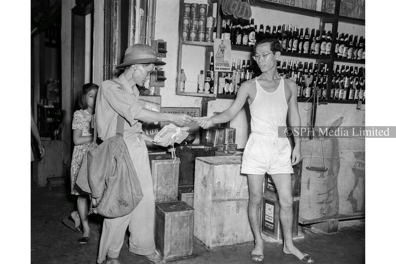 Postman delivering letters, 1952 Print