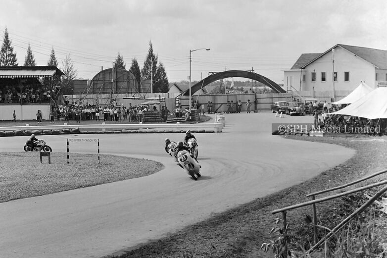 Motorcycles Pass the Grandstands at Circus Hairpin 1963-My Sg Memories