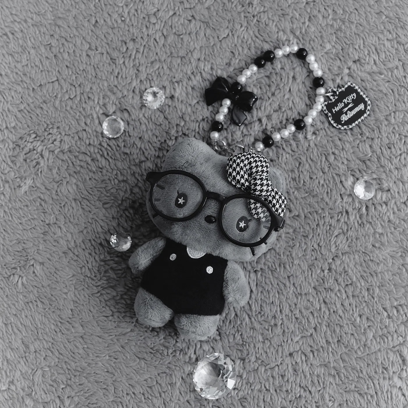 RM x Sanrio Houndstooth - Grey Hello Kitty with spectacles
