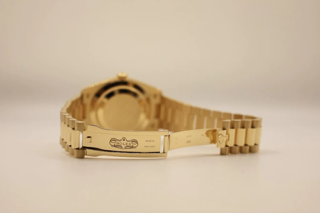 Rolex Day-Date 40 Presidential Champagne dial, Fluted Bezel, President bracelet, Yellow gold Watch