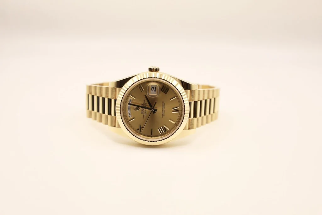 Rolex Day-Date 40 Presidential Champagne dial, Fluted Bezel, President bracelet, Yellow gold Watch