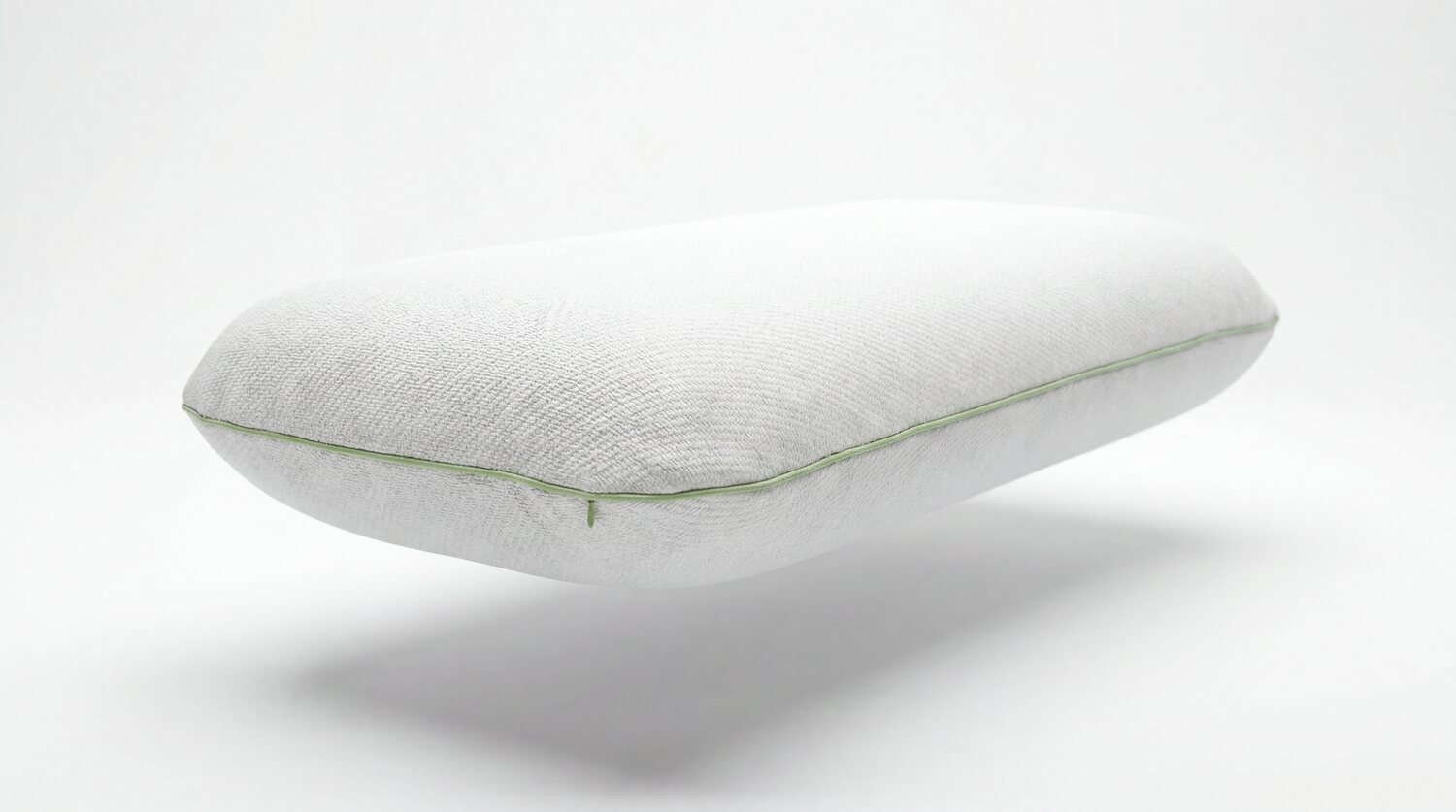 MemoryOne® Hybrid Pillow shown from the side, with its signature green-piped edge