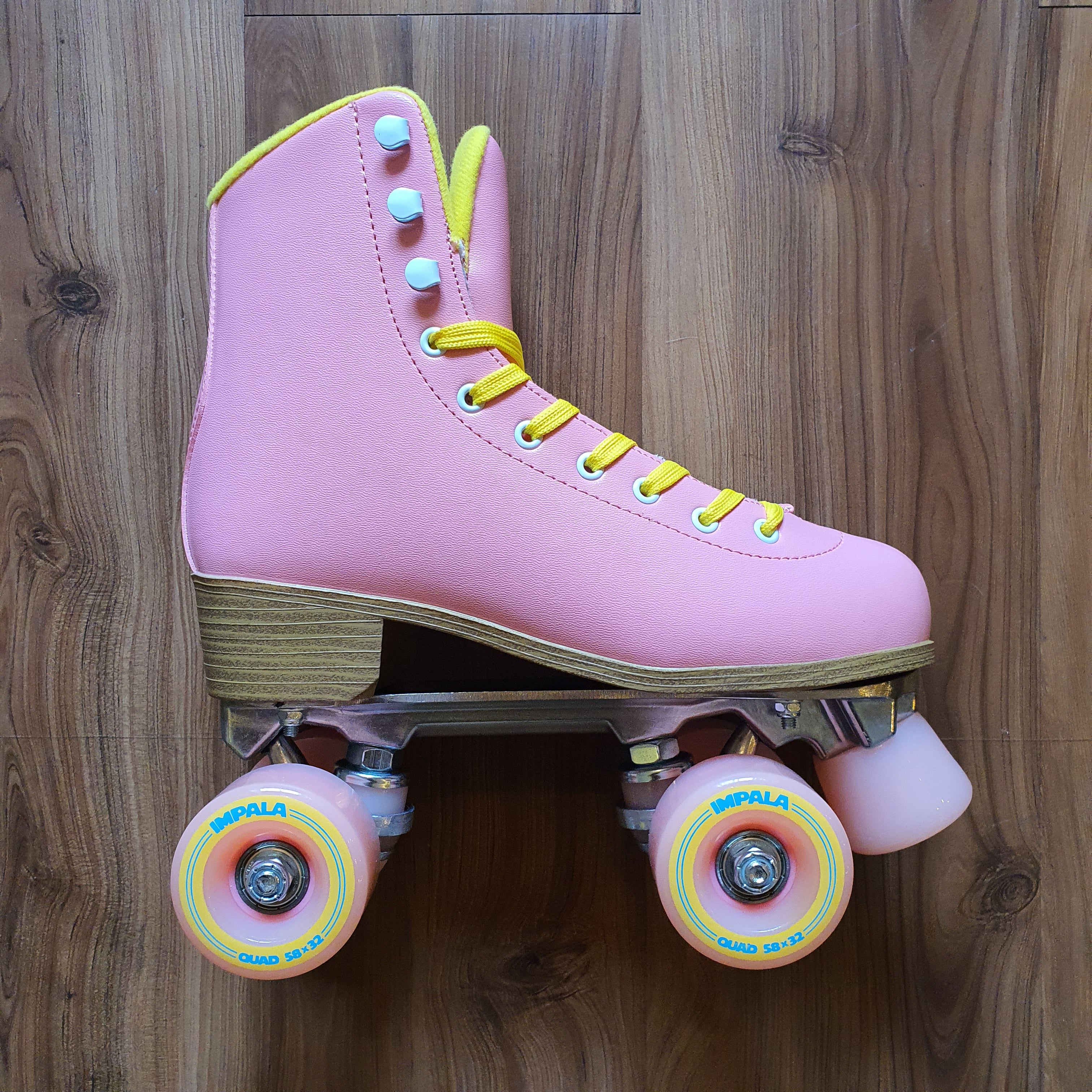 IMPALA - Pink Yellow Quad Roller Skates