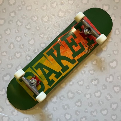 BAKER - Kader Ribbon Green Veneer Rainbow 8.125" Complete Skateboard (OJ + Shake Junt Custom Setup)