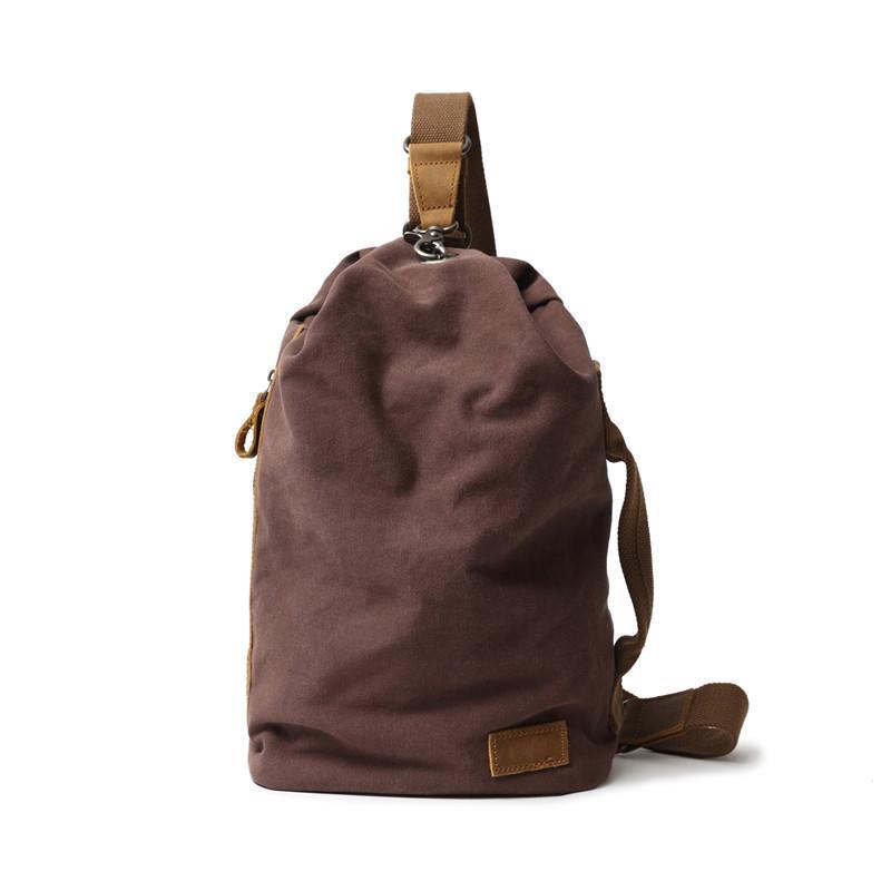 簡約日系文藝帆布胸包復古時尚休閒斜跨水桶包戶外單肩男士揹包