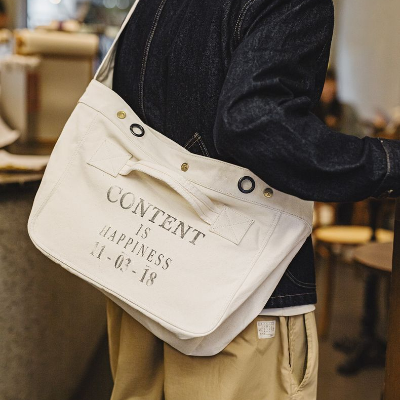 美式復古機車報童包大容量帆布郵差包印花字母斜挎包男生