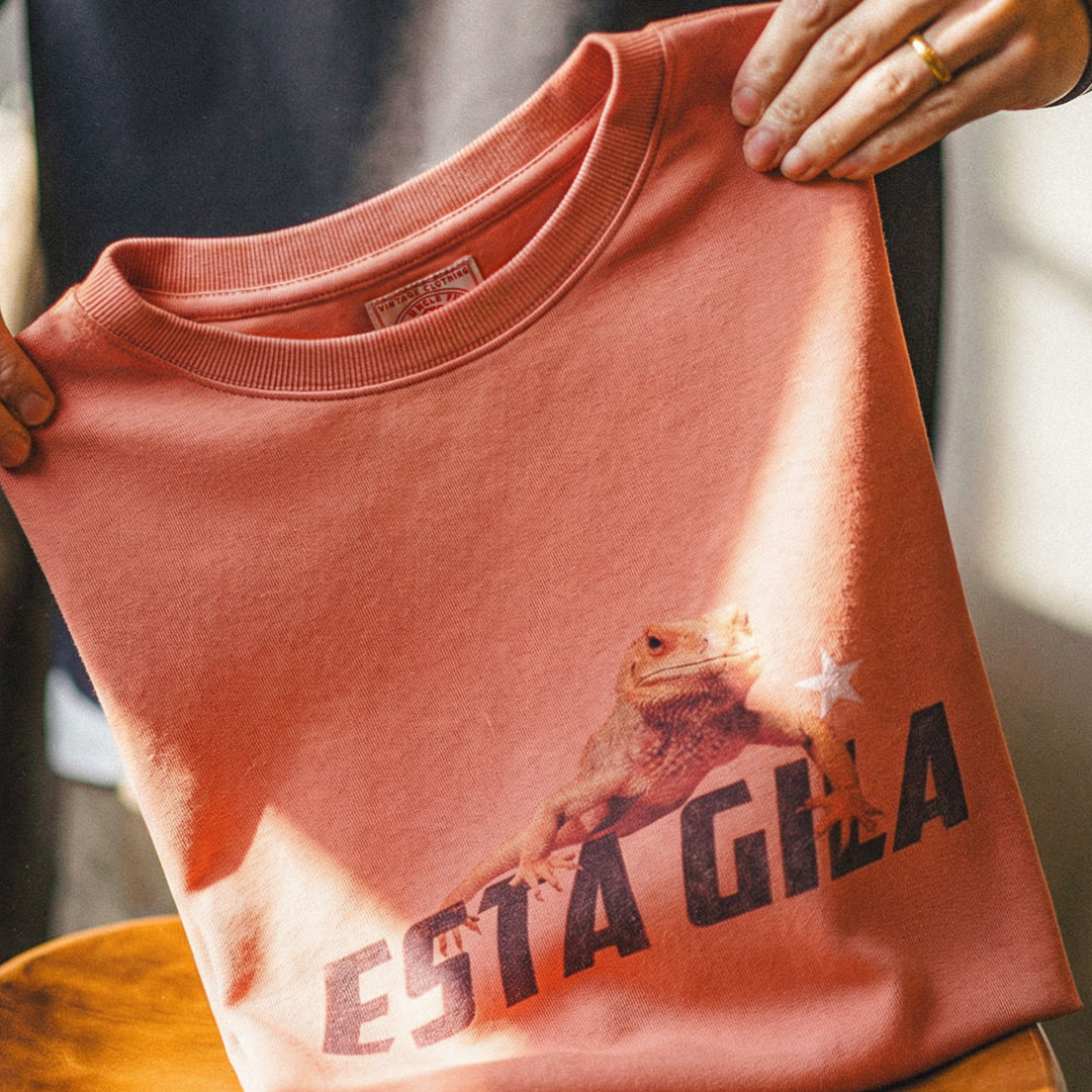 美式復古印花短袖上衣圓領落肩落日橘紅色針織T恤男夏季