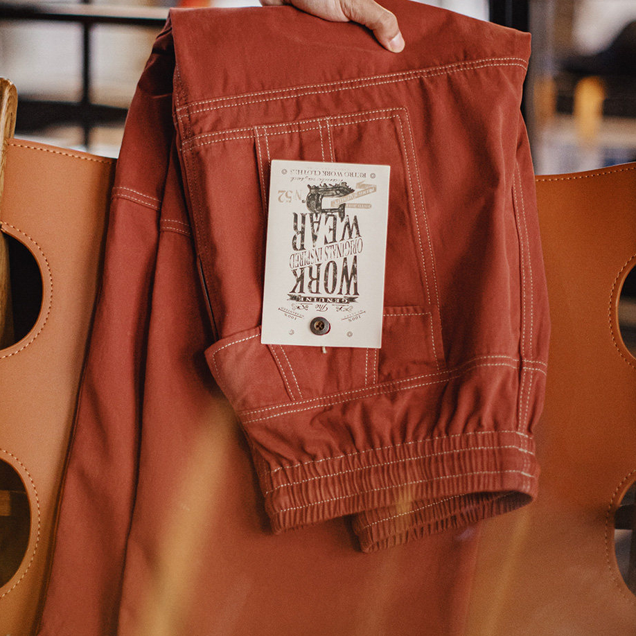 美式復古多口袋明線工裝褲磚紅色直筒闊腿束腳休閒褲男春