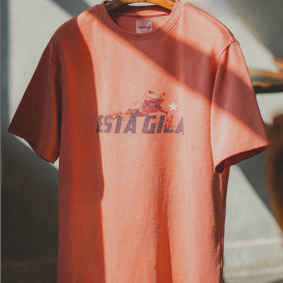 美式復古印花短袖上衣圓領落肩落日橘紅色針織T恤男夏季