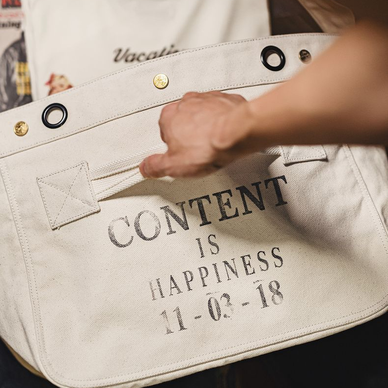 美式復古機車報童包大容量帆布郵差包印花字母斜挎包男生