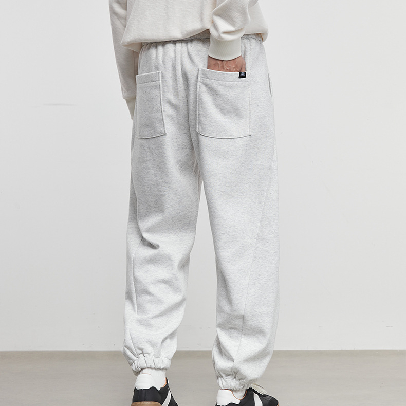 男裝素裁秋冬簡約抽繩束腳衛褲男寬鬆休閒運動風針織長褲
