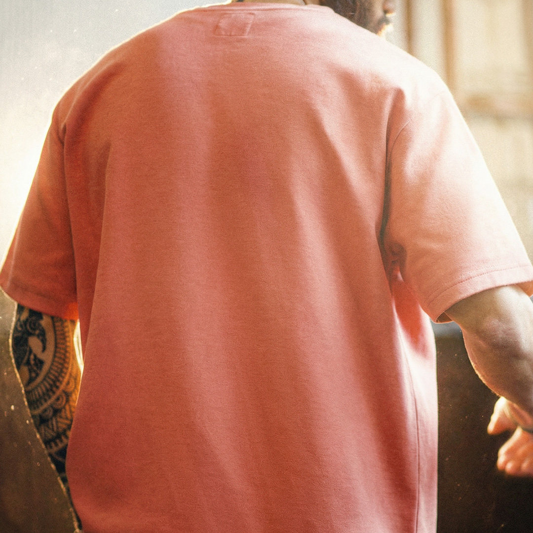 美式復古印花短袖上衣圓領落肩落日橘紅色針織T恤男夏季