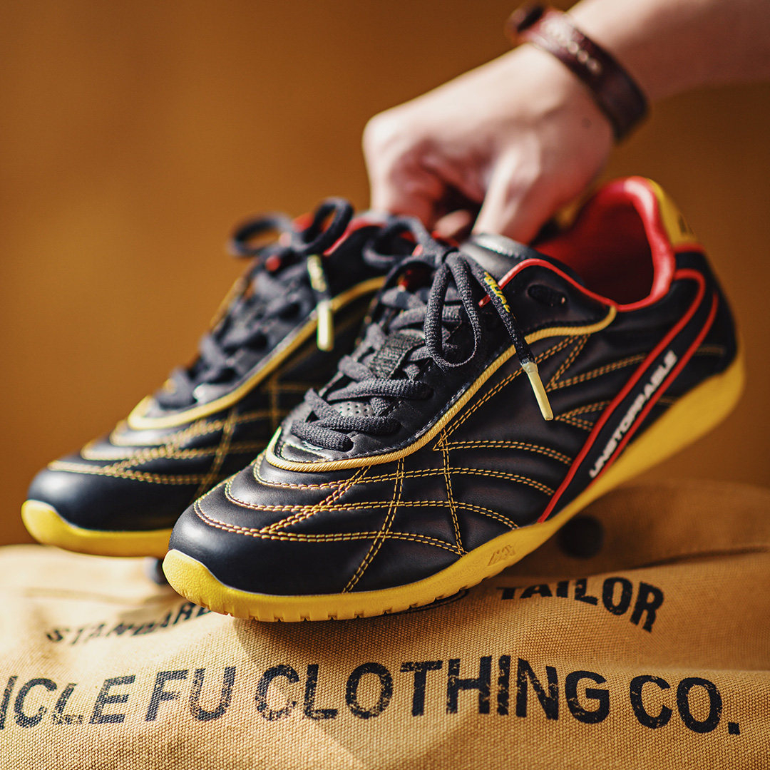 復古足球德訓鞋男春季新款翻蓋皮面黑黃色鞋子平底運動休閒鞋