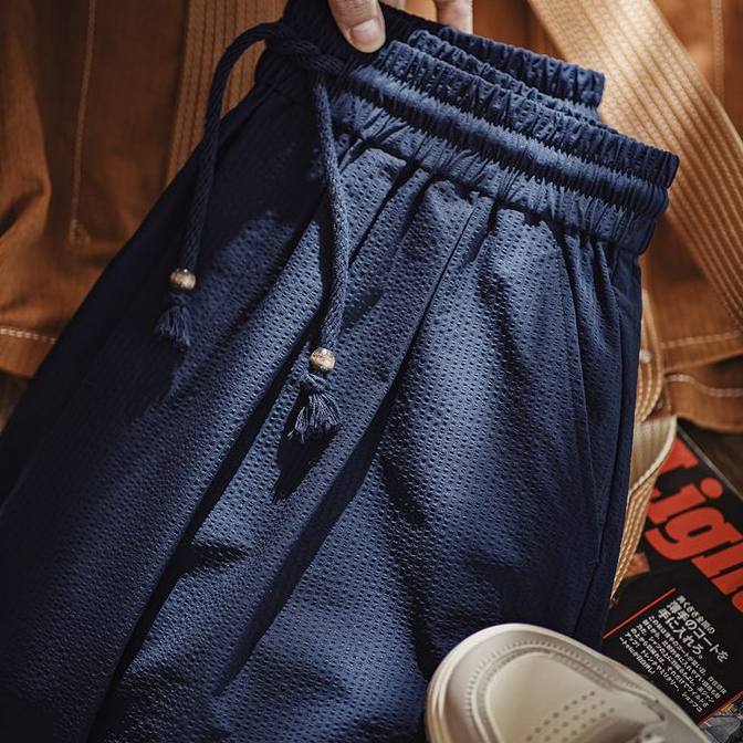 美式休閒束腰泡泡紗日系燈籠褲男寬鬆闊腿透氣彎刀褲春夏