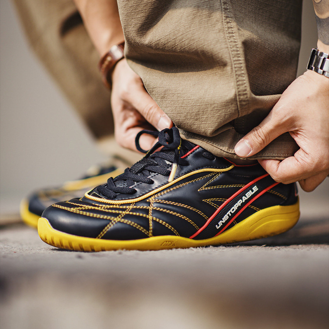 復古足球德訓鞋男春季新款翻蓋皮面黑黃色鞋子平底運動休閒鞋