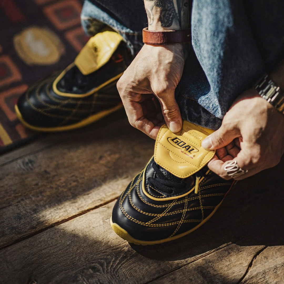 復古足球德訓鞋男春季新款翻蓋皮面黑黃色鞋子平底運動休閒鞋