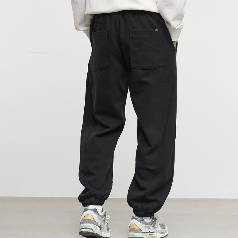 男裝素裁秋冬簡約抽繩束腳衛褲男寬鬆休閒運動風針織長褲
