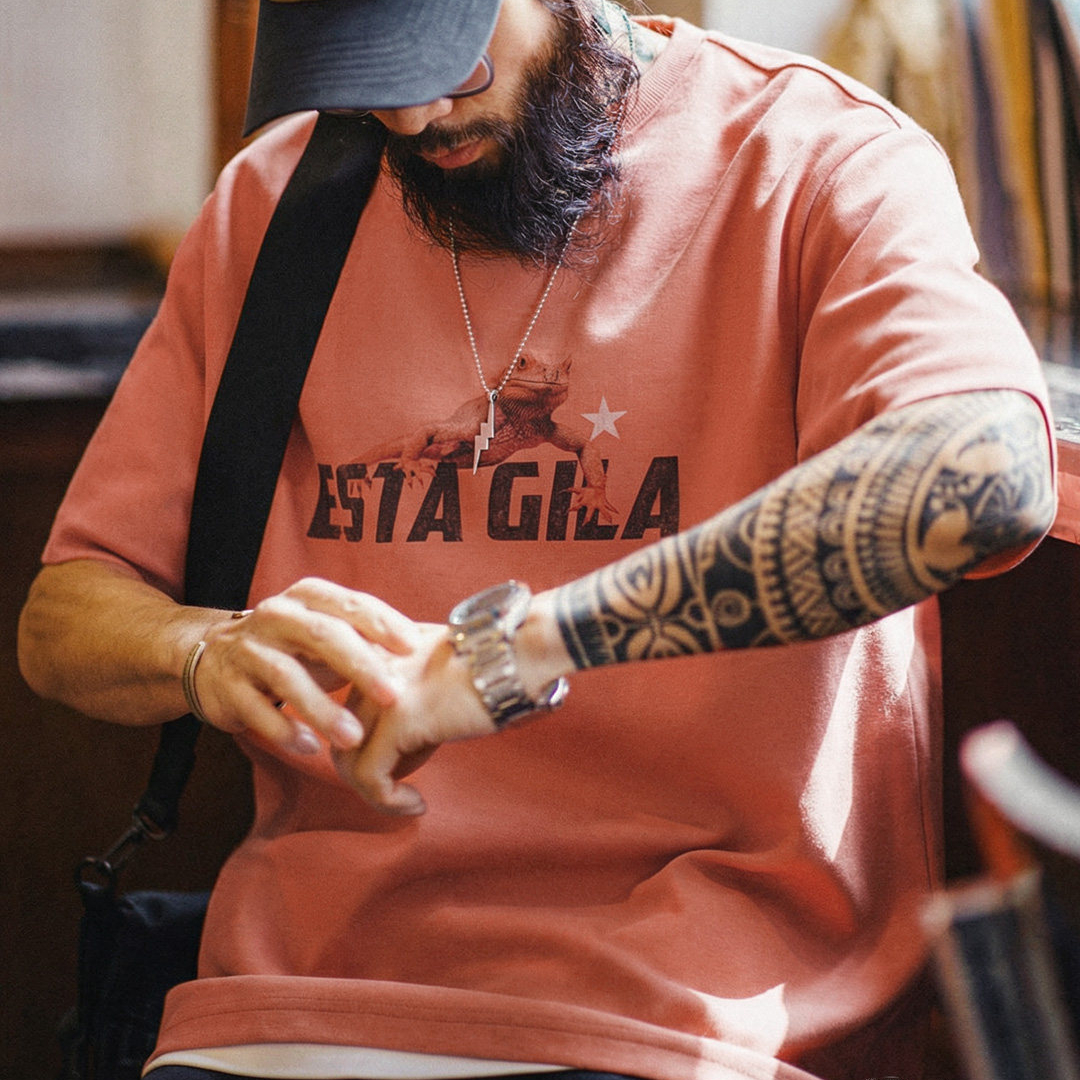 美式復古印花短袖上衣圓領落肩落日橘紅色針織T恤男夏季