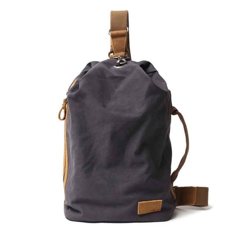 簡約日系文藝帆布胸包復古時尚休閒斜跨水桶包戶外單肩男士揹包