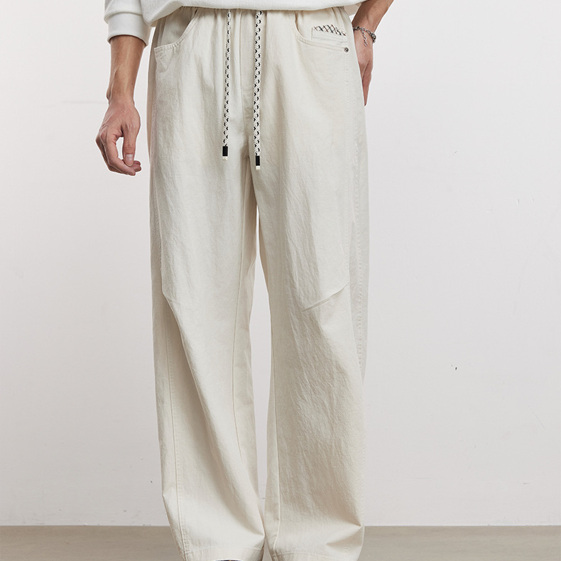 220g萊賽爾小彎刀休閒褲男春季純色寬鬆簡約百搭通勤直筒褲