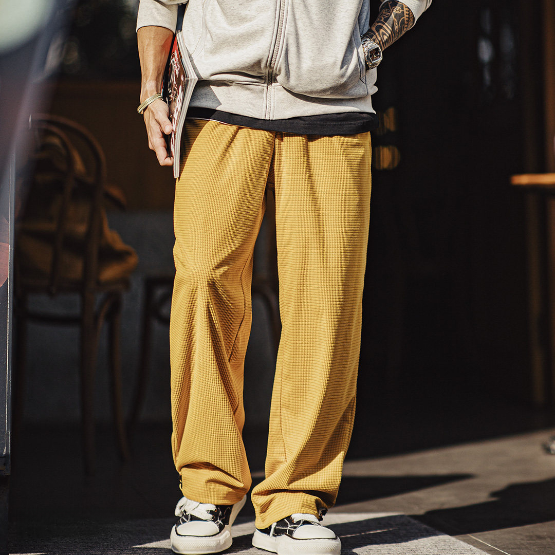 美式方格黃色玉米絨休閒褲直筒抽繩束腳寬鬆長褲子男款春