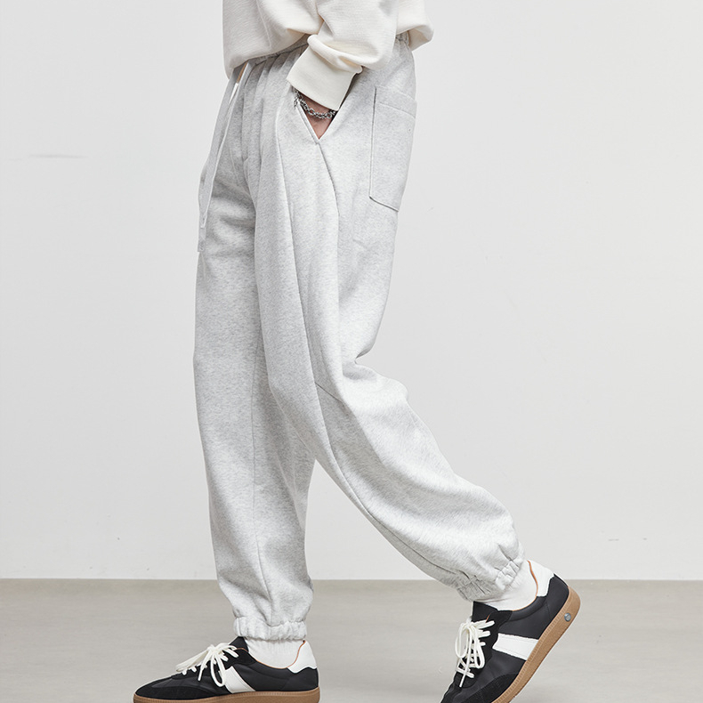 男裝素裁秋冬簡約抽繩束腳衛褲男寬鬆休閒運動風針織長褲
