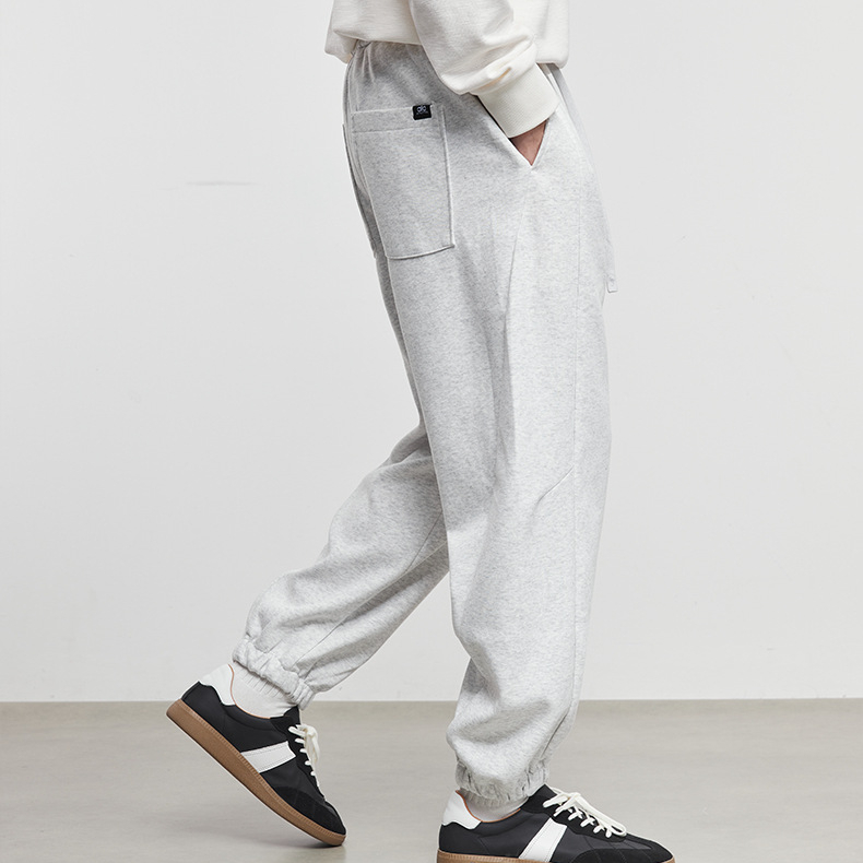 男裝素裁秋冬簡約抽繩束腳衛褲男寬鬆休閒運動風針織長褲